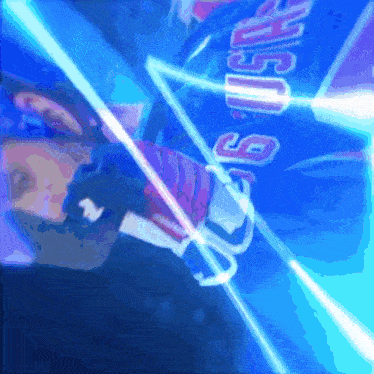 a person wearing a blue jersey that says usa on the front