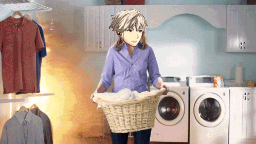 a woman is holding a laundry basket in a laundromat