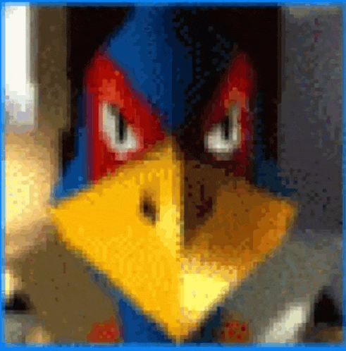 a pixelated image of a bird 's face with a blue hood