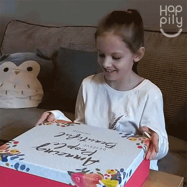 Opening The Gift Happily GIF - Opening The Gift Happily Gift Reveal GIFs
