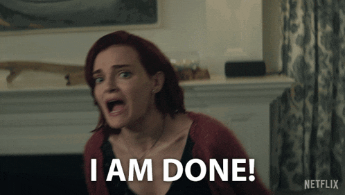 a woman with red hair is screaming and says i am done