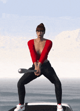 a woman in a red top and black pants is squatting down holding a baseball bat