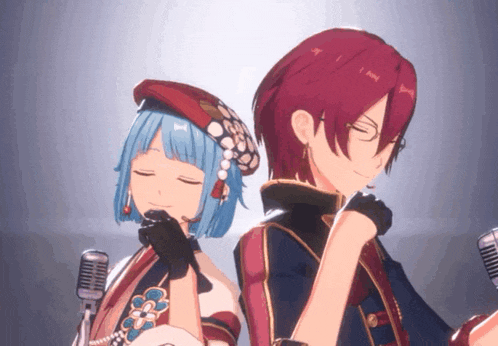 a boy and a girl are standing next to each other with their eyes closed