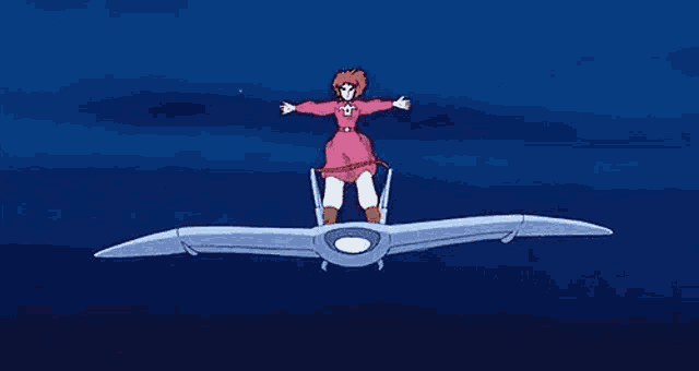 a woman in a pink dress is flying on a flying machine in the sky .