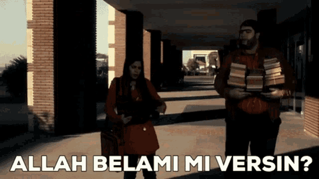 a man and a woman are walking down a hallway and the man is carrying books and the woman is holding a purse