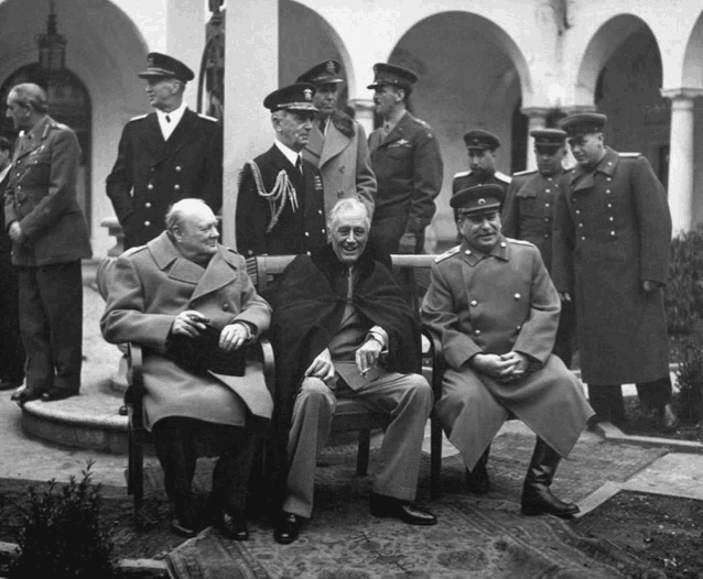 a group of men in military uniforms are posing for a photo with one man wearing a badge that says cccp