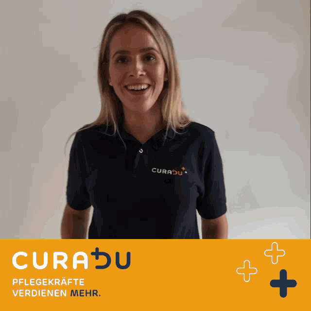 a woman giving a thumbs up in front of a yellow sign that says curadu