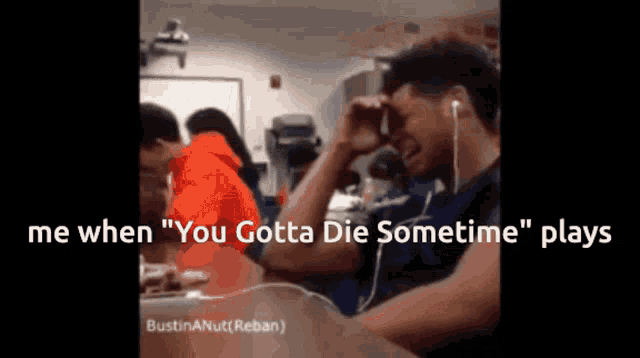 a man wearing ear buds is sitting in a classroom with the caption " me when "