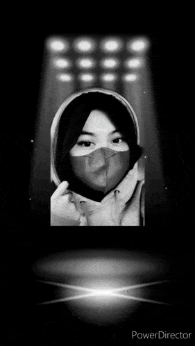 a black and white photo of a woman wearing a face mask and the words aquarius antap