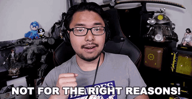a man wearing headphones and a shirt that says " not for the right reasons " on it
