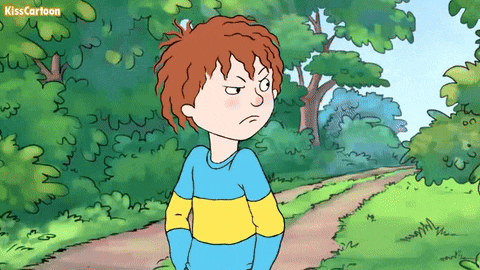 a boy in a blue and yellow striped shirt stands on a dirt path with trees in the background and the words kisscartoon above him
