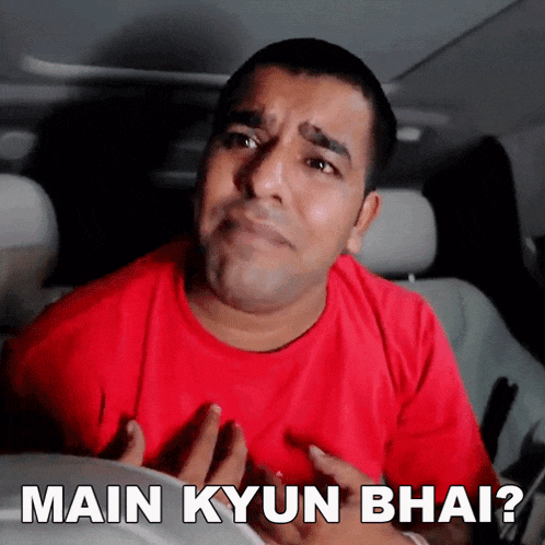 a man in a red shirt with the words main kyun bhai