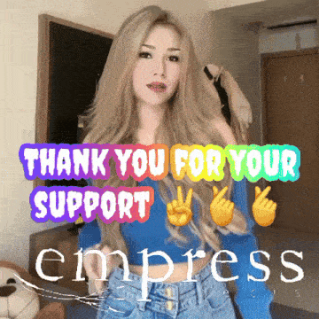 a woman stands in front of a sign that says " thank you for your support "