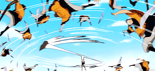 a bunch of people are flying in the air with a blue sky in the background