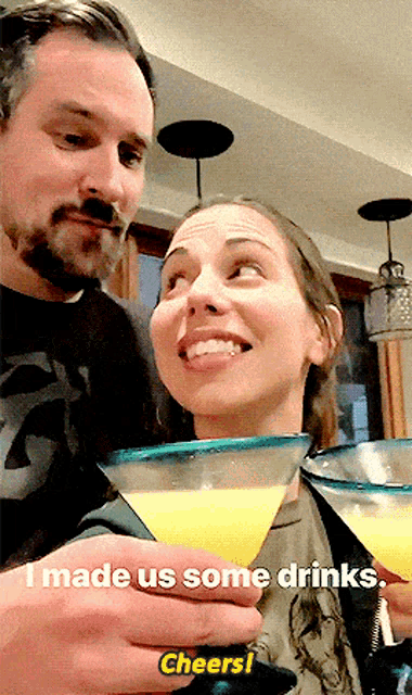 a man and a woman toasting with drinks with the words " i made us some drinks "