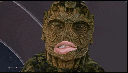 a close up of a person 's face with a pink mouth