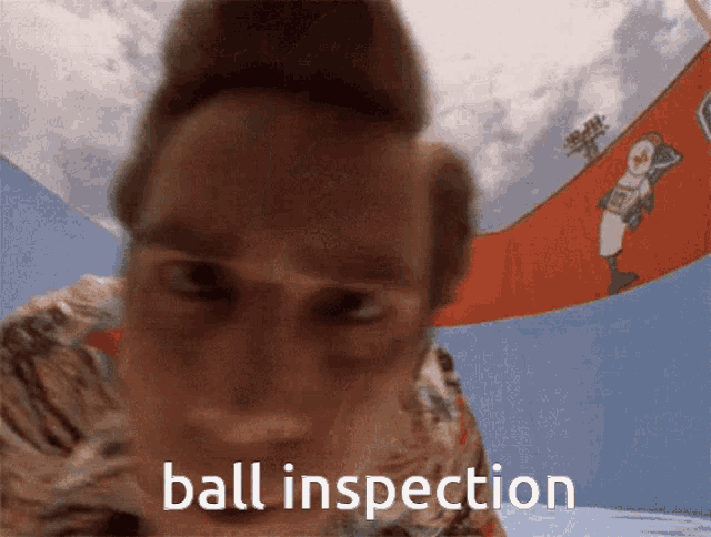 a close up of a person 's face with the words ball inspection written on the bottom