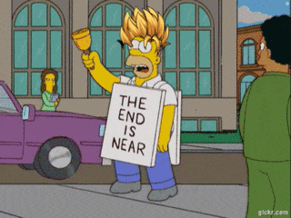 homer simpson from the simpsons holding a sign that says the end is near