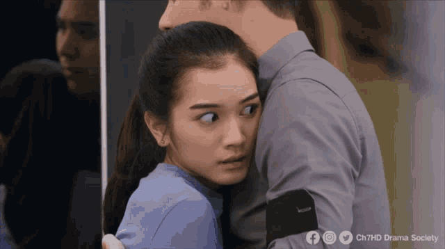 a man and a woman hugging with the words ch7hd drama society below