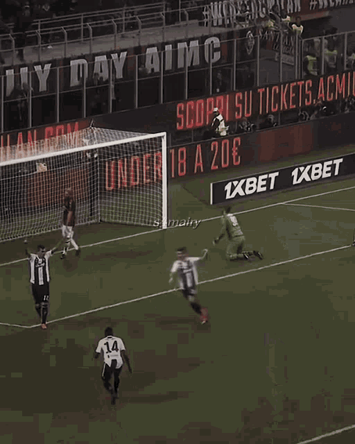 a blurry picture of a soccer player wearing a juventus shirt