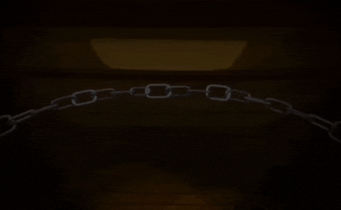 a cartoon character is chained to a wall with a chain around her neck