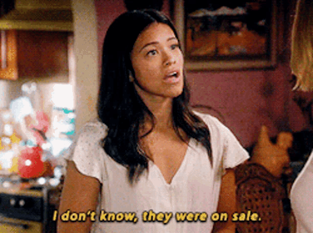 a woman says " i don 't know they were on sale " in a kitchen