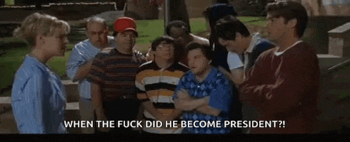 a woman is standing in front of a group of people and says `` when the fuck did he become president '' .