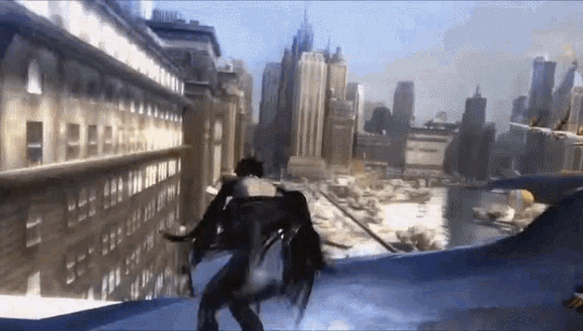 a person is flying through the air in a city