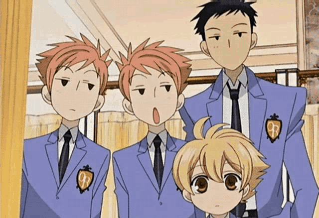 a group of anime characters wearing suits and ties with the letter r on their jackets