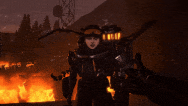 a woman in a futuristic outfit stands in front of a fire