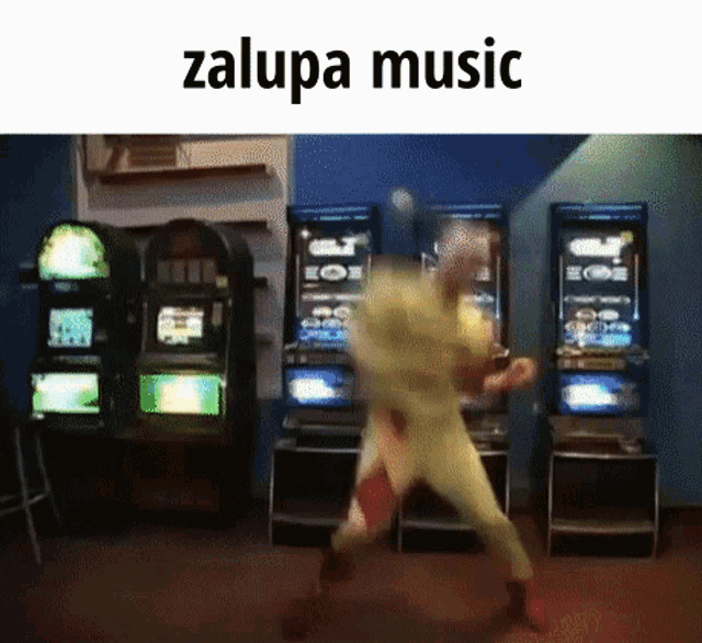 a man in a yellow suit is dancing in front of a bunch of slot machines with the words zalupa music written above him