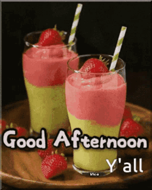 two smoothies with strawberries and the words good afternoon y 'all
