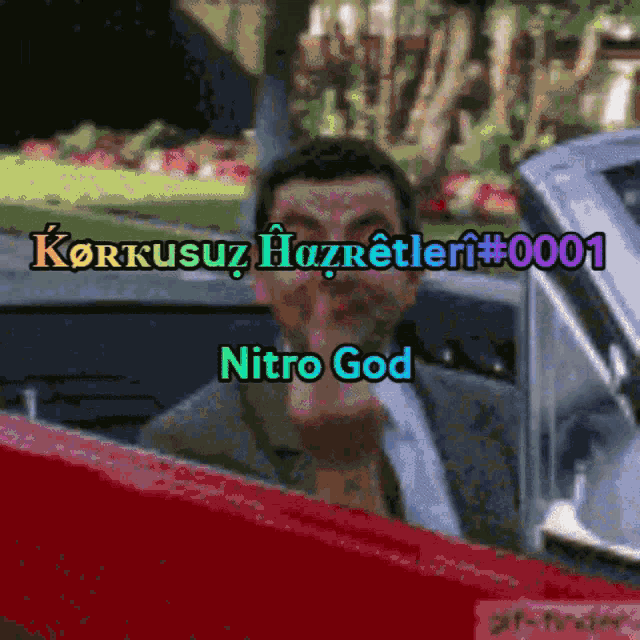 a man sitting in a car with the words korkusuz hazretleri # 001 nitro god