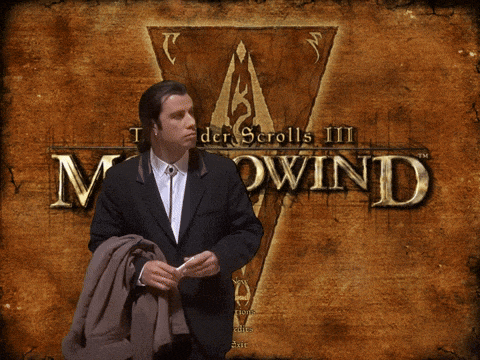 a man in a suit is standing in front of a mc wind sign
