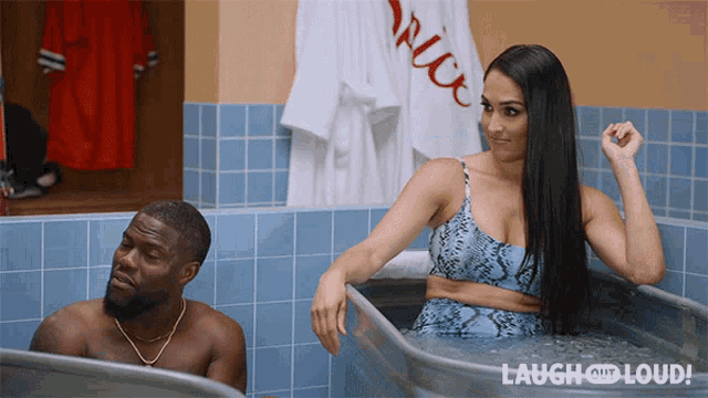 a man and a woman in a bathtub that says laugh loud