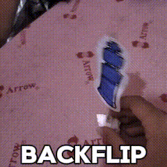 a person is holding a toothbrush in their hand and the word backflip is above them