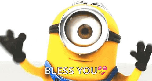a minion with a big eye and the words bless you