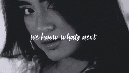 a black and white photo of a woman 's hands and the words we know whats next