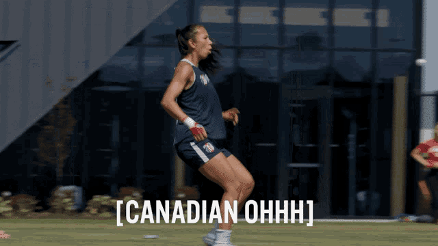 a woman is jumping in the air with the words canadian ohhh