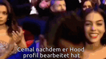 a woman is smiling in front of a crowd with the words cemal nachdem er hood profil bearbeitet hat written below her