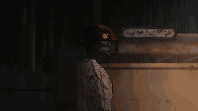 a person with a chainsaw on their head with chinese writing on the chainsaw