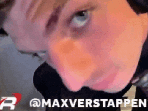 a close up of a person 's face with the words " maxverstappen " on the bottom