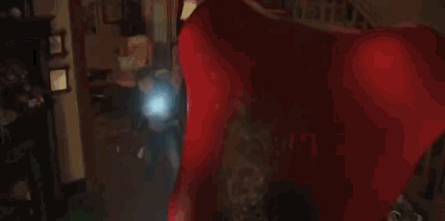 a projector is projecting a light on a pile of candy .