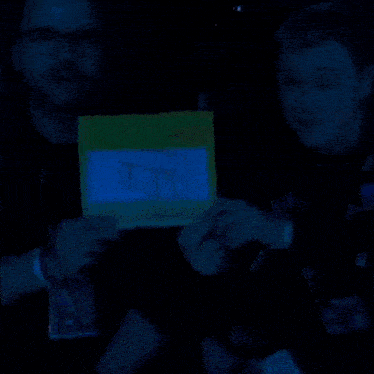 a man is holding a sign that says fix vac