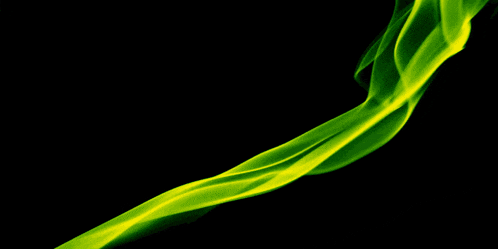the word welcome is on a black background with green smoke behind it