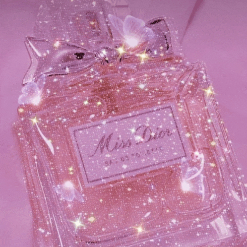 a bottle of miss dior perfume with a butterfly on it