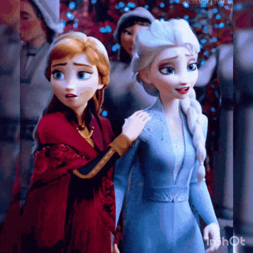 anna and elsa from frozen ii are standing next to each other .