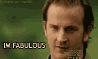 a man is saying i 'm fabulous in a close up of his face .