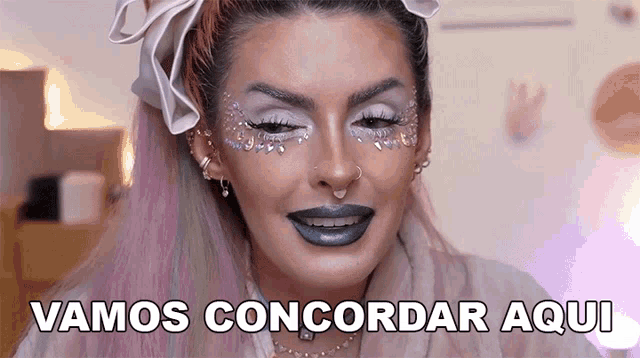 a woman with makeup on her face and the words vamos concordar aqui