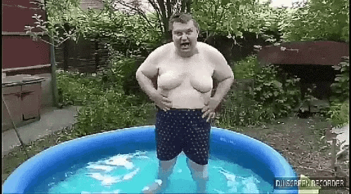 a fat man is standing in an inflatable pool with his mouth open